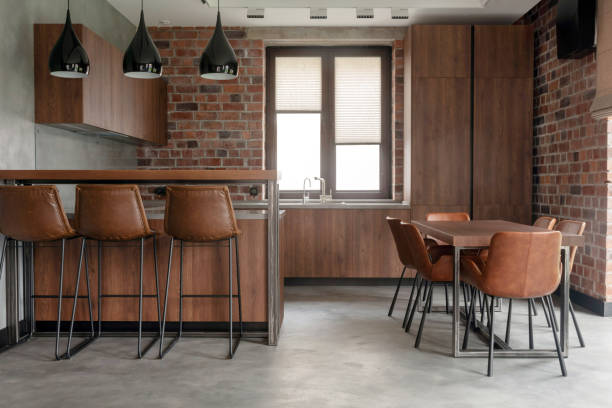 istock Simple light modern interior of loft dinning room 1296436709