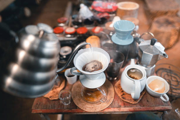 istock Drip coffee,Dripping coffee on a table at a country cafe. 1296440003