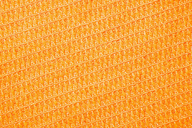 istock Yellow orange bright textile abstract background with diagonal stripes, fabric texture blank with copy space 1296440947