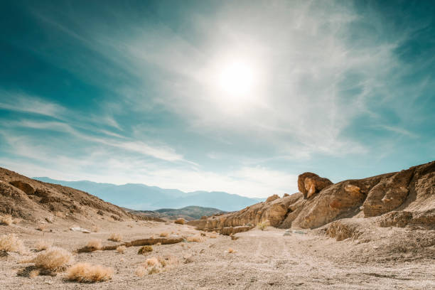 Death Valley Death Valley is a desert valley located in Eastern California. It is the lowest, driest, and hottest area in North America. salt flat stock pictures, royalty-free photos & images