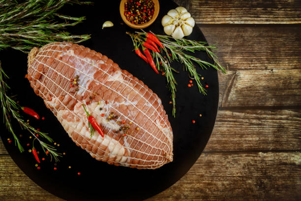 istock Tenderloin of pork ready for roasting with spices. 1296441185