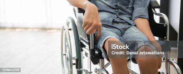 Disability Polio Patient Sitting On Wheelchair In Hospital Banner With Copy Space Stock Photo - Download Image Now