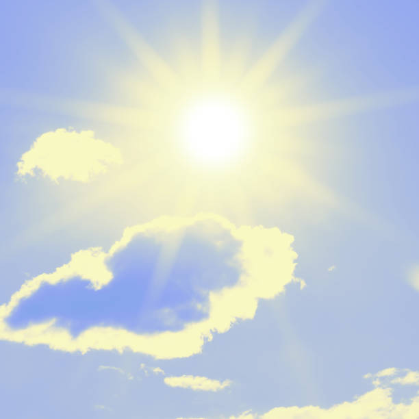 istock Bright sun with beautiful beams in the sky with clouds 1296444493