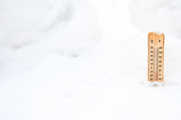 istock Thermometer in winter garden present temperatures under zero degrees, background white snow,winter's life in europe in frosty and the weather is very cold . 1296444850