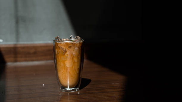 istock Glass of coffee on the table 1296447211