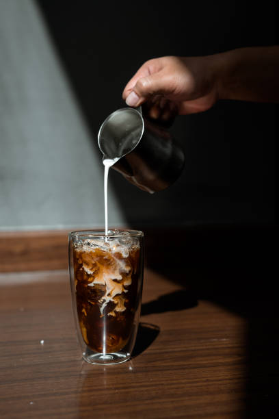 istock Glass of coffee on the table 1296447287