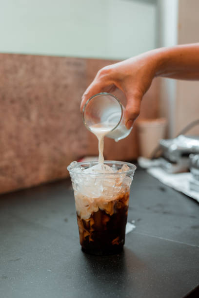 istock Glass of coffee on the table 1296449565