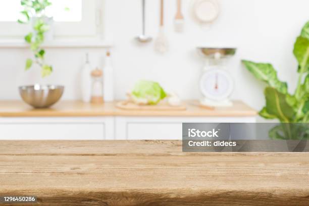 Wood Table Top On Blur Kitchen Room Counter Background Stock Photo - Download Image Now