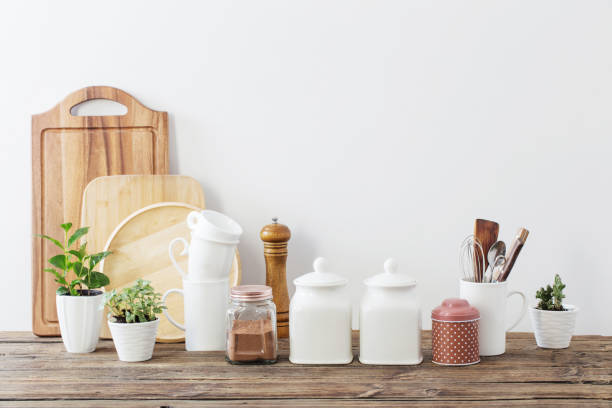 istock kitchen utensils on  wooden table in  white kitchen 1296450355
