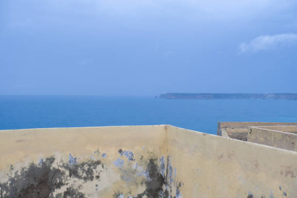 Praia Dona Ana is a popular beach cove near Lagos in the Algarve area of Portugal. The stunning beach is surrounded by imposing, colorful cliffs, stunning rock formations and the clear turquoise waters of the Atlantic Ocean.