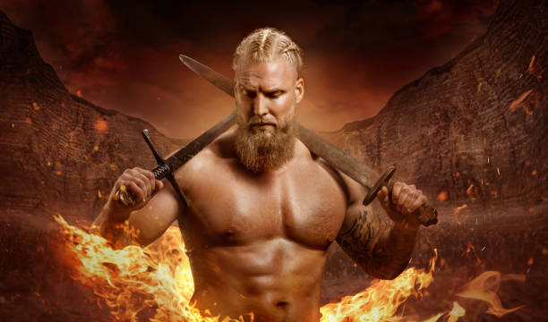 Weapon wielding viking inspired warrior in a fantasy fire setting