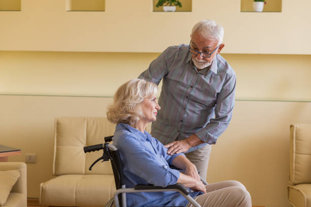 istock Disabled Woman is Enjoying the Time with her Husband While at Home. 1296462643