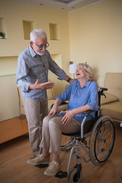 istock Man Shows a Love to his Disabled Woman. 1296462899