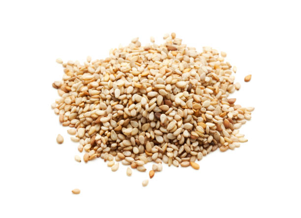 sesame seeds isolated heap of sesame seed isolated on white sesame seed stock pictures, royalty-free photos & images