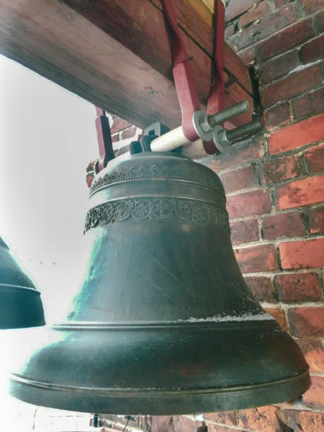 istock Old temple tower with bells on top of red brick 1296469575