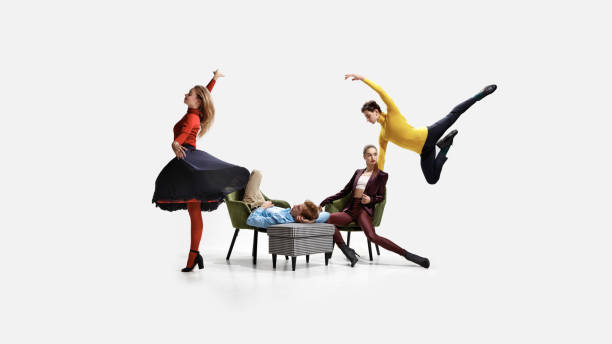 istock Graceful young people ballet dancers posing isolated on white background. 1296470415