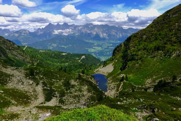 istock gorgeous mountain lake in the mountains while hiking 1296472356