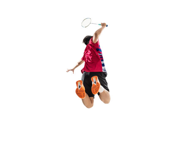 istock Asian badminton player is hitting in white background 1296473496
