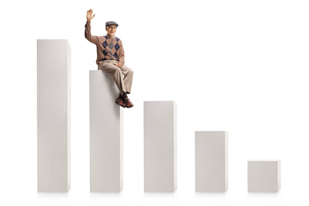 istock Elderly man sitting on a column from a chart and waving with hand 1296473626