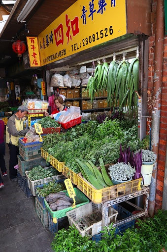Herb market in Taipei, Taiwan. The herb lane is a specialty Chinese medicine herbal shopping area at Xichang Street.