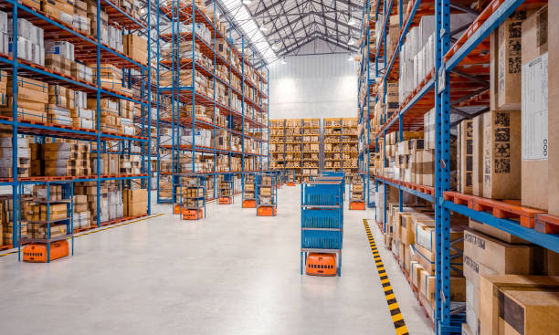 istock interior of a modern warehouse where automated goods transport vehicles work. 1296474765