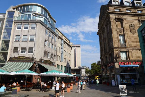 People visit Markt, main city square in Dortmund, Germany. Dortmund is the largest city in Ruhr area of Germany.