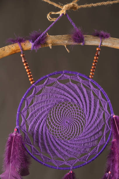 istock dream catcher made of purple thread 1296475937