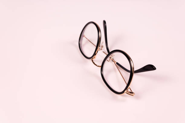 istock side view of glasses with arms folded 1296478342