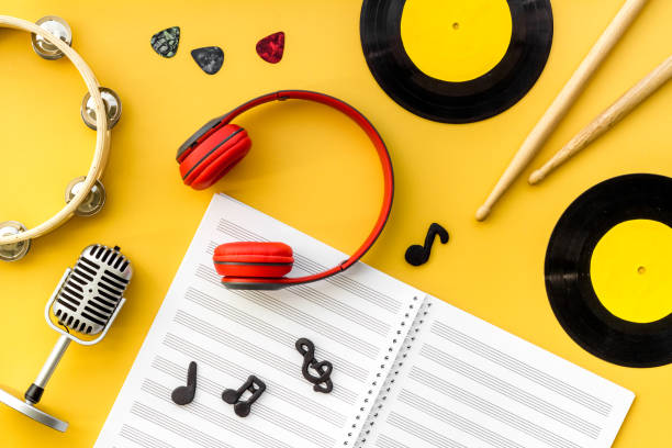 istock Background music flat design - instruments, microphone and headphones, top view 1296489257