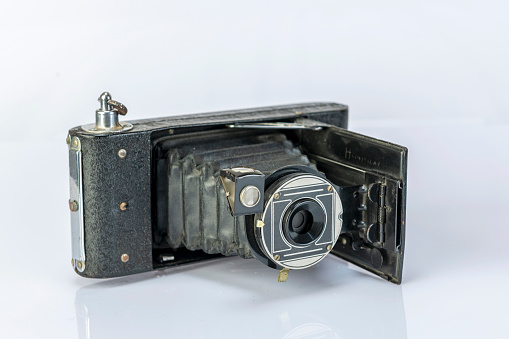 Vintage medium format film TLR camera, on white background. Film TLR camera.