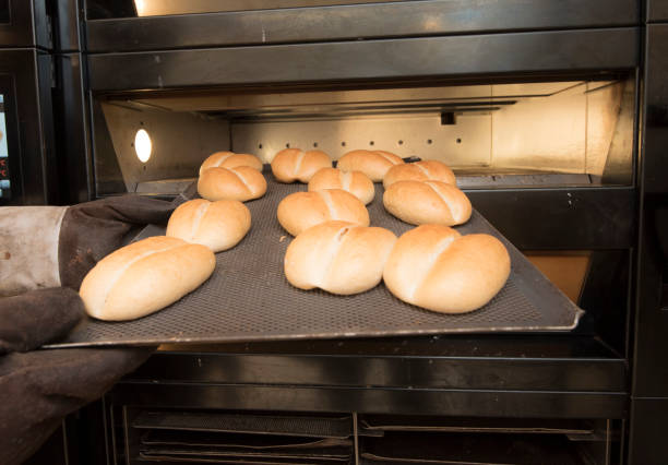 istock buns or bread rolls fresh from the oven 1296492519