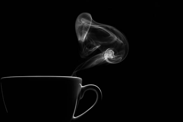 istock cup of coffee with smoke in black & white 1296493856