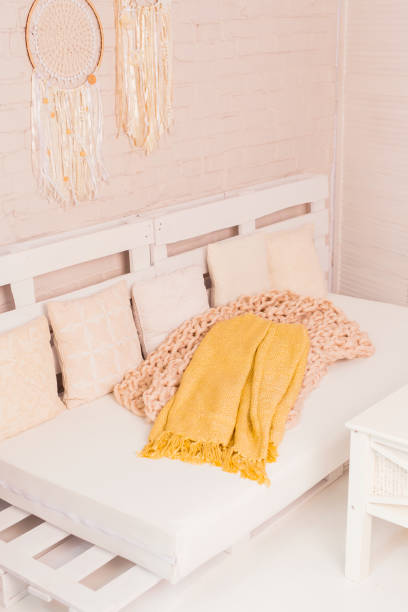 istock Pallet seats closeup with pillows 1296494056