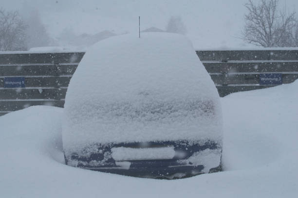 istock car and snow in winter 1296495423