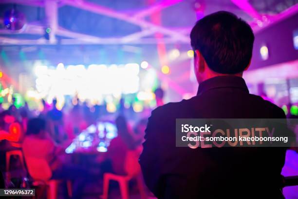 Security Guard Are Regulating The Situation Of Safety In An Event Concert In A Nightclub Stock Photo - Download Image Now