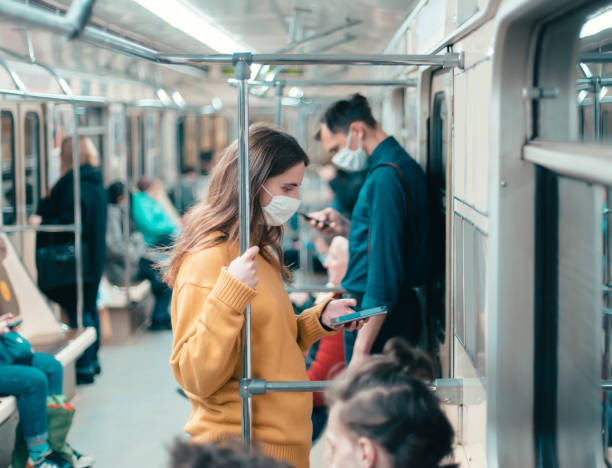 istock variety of passengers ride the subway car 1296497829