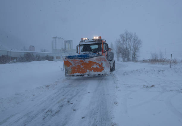 istock snow plow on country road 1296497874