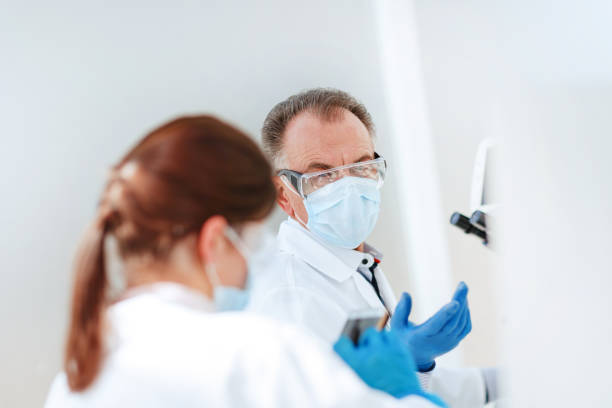 istock close up. biologists work in a medical laboratory 1296497959