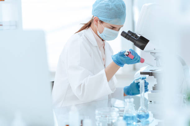 istock female scientist conducts research in the laboratory 1296498048