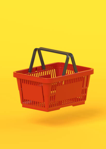 istock Flying red empty shopping basket on yellow background 1296500652