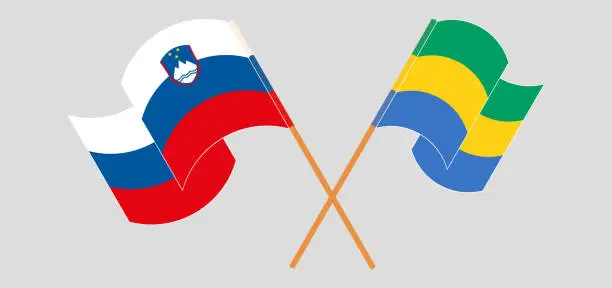 Vector illustration of Crossed and waving flags of Slovenia and Gabon