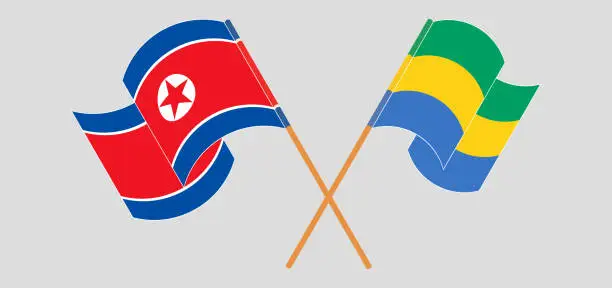 Vector illustration of Crossed and waving flags of North Korea and Gabon
