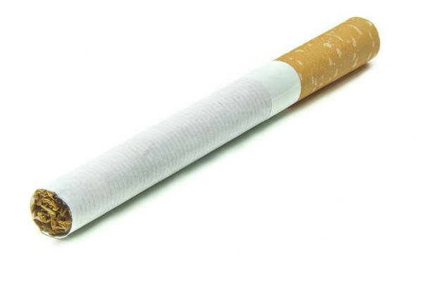 istock Studio shot of a single cigarette with white background 1296504944