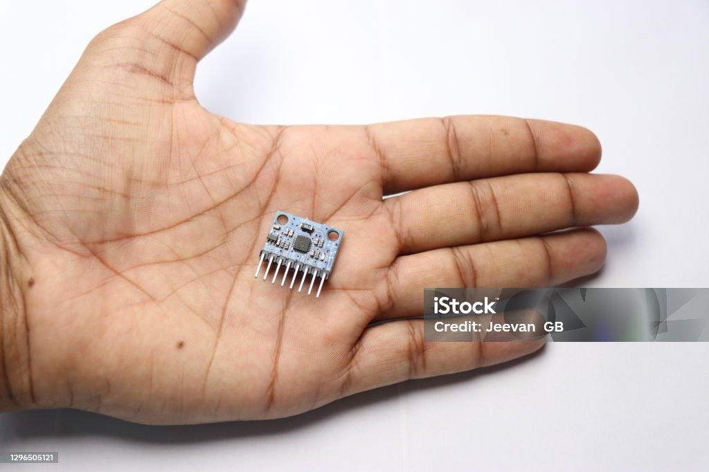 MPU 6050 or MPU6050 which has built in gyroscopic sensor, accelerometer and temperature sensor used for various electronic projects held in hand Sensor Stock Photo