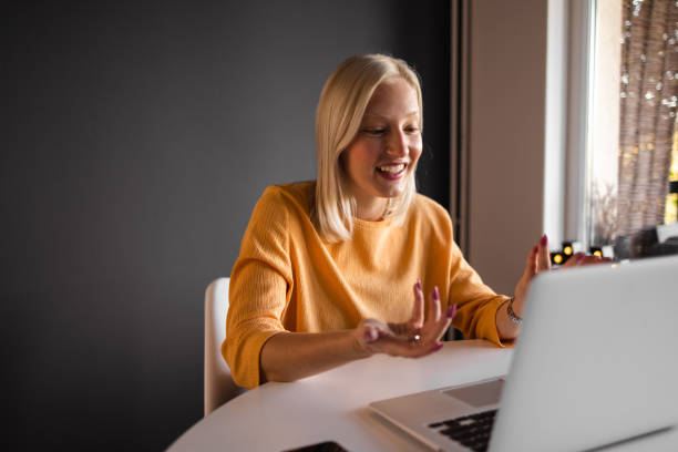 istock Young woman working from home 1296506098