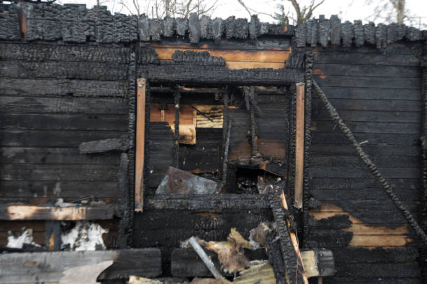 istock ruins of a burned out house 1296509092