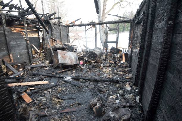 istock ruins of a burned out house 1296510263