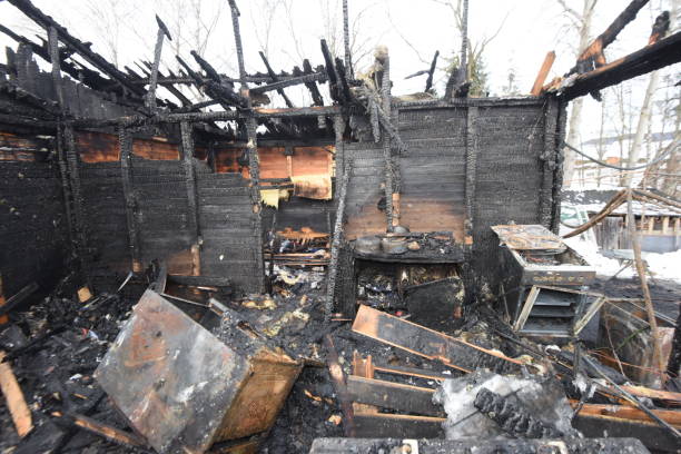 istock ruins of a burned out house 1296510288