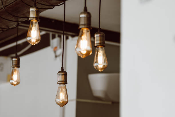 istock Beautiful vintage light decor. Lamp loft style. Lighting in design. Retro style 1296511647