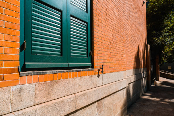 Wall with vents to allow the passing of air to cool machinery.